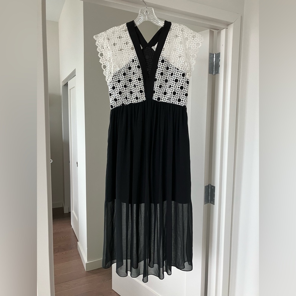Sandro black and white dress with lace top.
